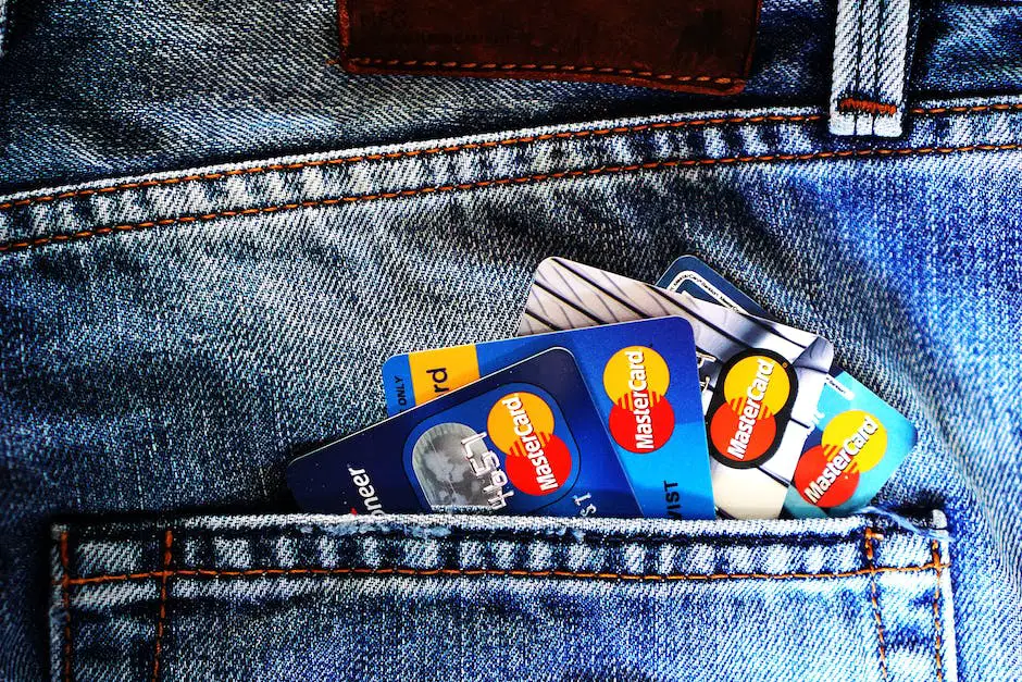 Image depicting a person holding multiple credit cards, illustrating the concept of credit card debts and financial burden.