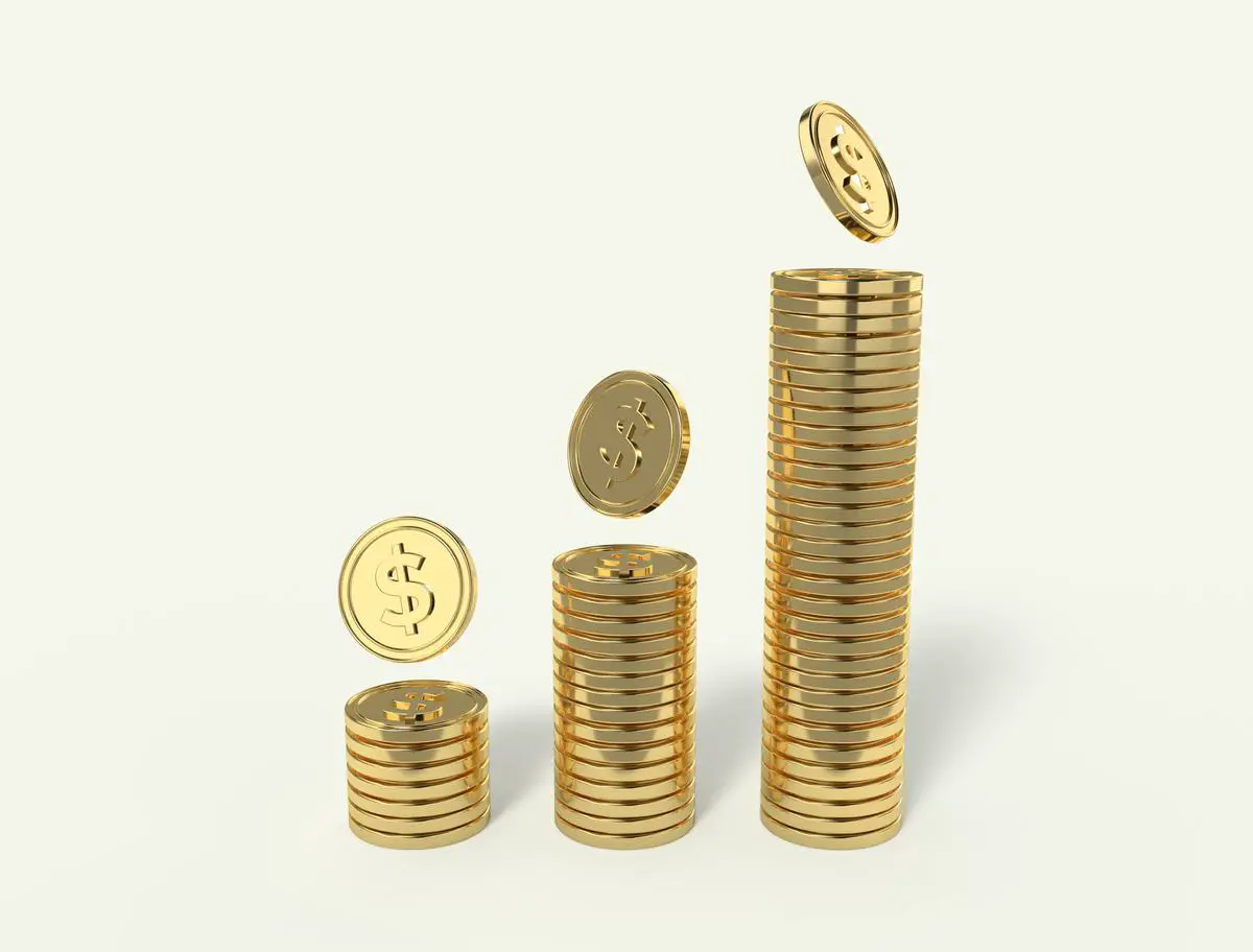 A city skyline with stacks of coins representing tax evasion